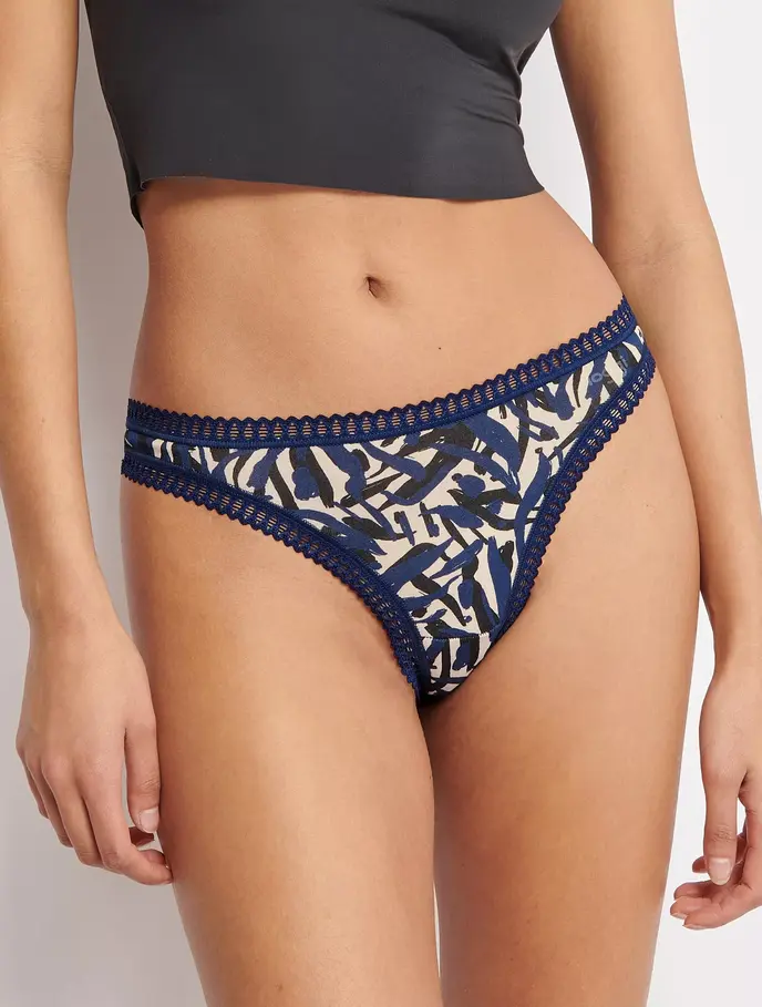 Original model wearing our printed lace-trim bikini